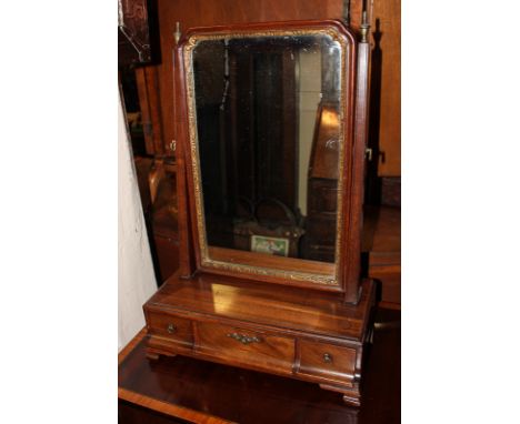 A 19th century mahogany dressing table mirror, with rectangular frame and box base with three drawers, on bracket feet, 39cm