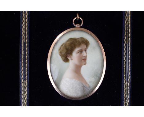 An Edwardian oval portrait miniature of a lady in a white dress, gilt metal frame, in fitted case, 7.5cm by 5.8cm