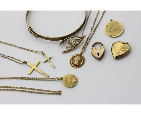 A 9ct gold bangle, five chains and pendants, a horseshoe brooch, 28.8g weighable, and three gilt items