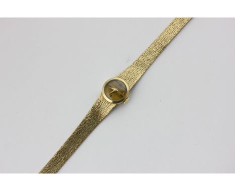 D'Aubeny, a lady's 9ct gold bracelet watch, manual wind with tiger's eye dial, London hallmark for 1977