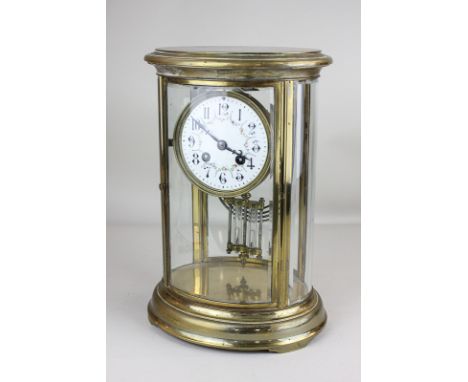 A gilt metal four-glass mantel clock with circular 4 inch dial with floral decoration, movement with mercury pendulum, striki