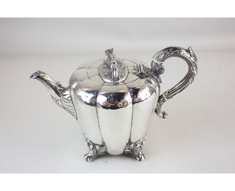 A Victorian silver teapot of melon form, maker John Tapley, London 1842, with fox finial, the underside of the lid presented 