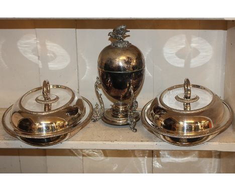 A pair of silver plated oval tureens and covers with gadrooned borders and removable oval loop handles, 27cm, together with a