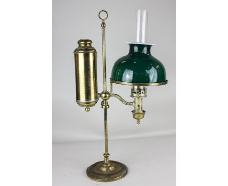A brass adjustable oil lamp with green glass shade and clear glass funnel marked 'Olympic fireproof made in Saxony', the lamp