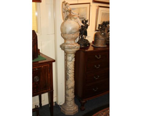 An Art Deco style marble standard light with figure of a dancer seated on globe shade (a/f) with vase and column support (a/f