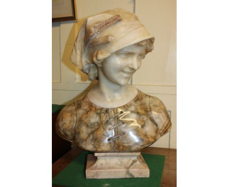 A Victorian carved marble bust of a woman, wearing a head scarf, wheat sheaves tucked behind one ear, signed twice 'R Codon' 