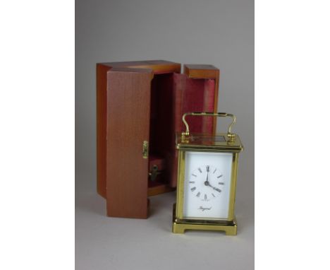 A Bayard brass and bevelled glass cased carriage clock, the movement marked seven jewels unadjusted Duverdrey & Bloquel Franc