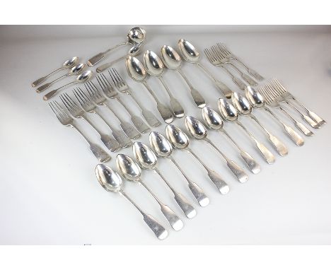A George IV and later silver fiddle pattern part matched canteen comprising four tablespoons, ten dessert spoons, five table 