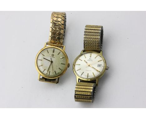 A gold plated automatic watch by Omega, and another with manual wind movement, both on expanding bracelets