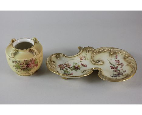A Royal Worcester porcelain dish of scalloped form with scroll border and floral design on blush ground, together with a simi