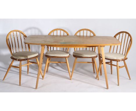 Ercol blonde elm dining table, with a set of four spindle back dining chairs, 152cm long x 76cm deep (5)