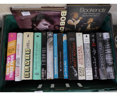 A collection of pop music books including Bob Dylan, Johnny Cash, Joan Baez, Jerry Lee Lewis, Elvis Presley, etc. 