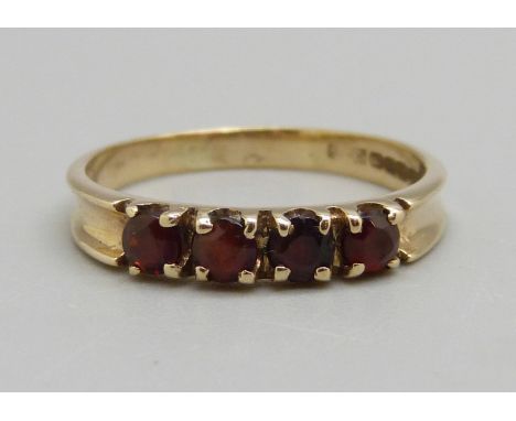 A 9ct gold four stone garnet ring, 2g, P 