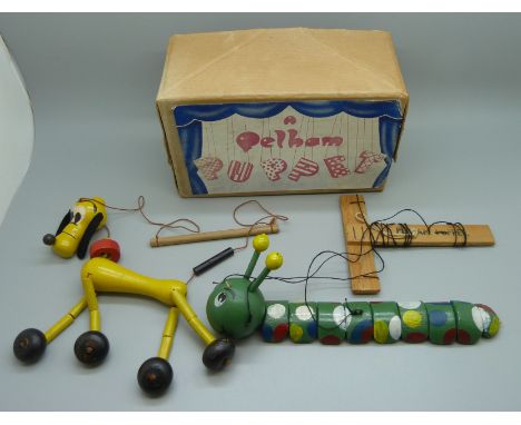 A Pelham puppet caterpillar, boxed 