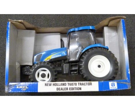 An Ertl New Holland T6070 die-cast model Tractor, dealer edition, boxed 
