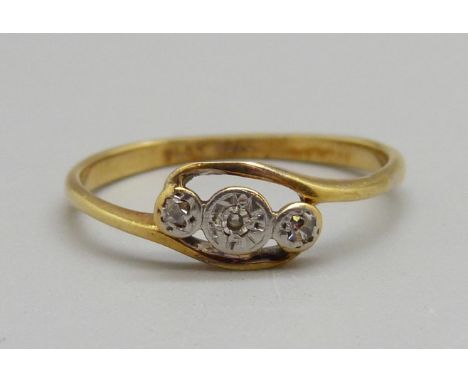 An 18 ct gold, platinum set three stone diamond ring, 2.1g, P 