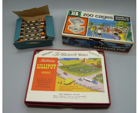 Britains Lilliput Series 00 scale models, Britains Zoo cages and a box of Belisha beacons 