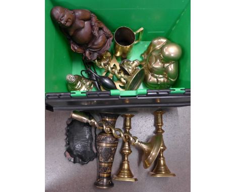 A collection of brass including Buddha, a trivet, trench art mug, a vase, two pairs of candlesticks, carved wooden Buddha, et