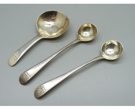 A pair of silver mustard spoons, London 1806, Peter &amp; William Bateman, and a silver caddy spoon, 29g 