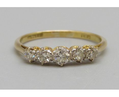 An 18ct gold, platinum set five stone diamond ring, 2.4g, Q 