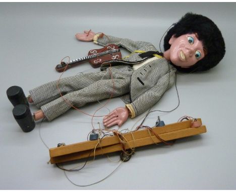 A Beatles Pelham puppet, George Harrison 