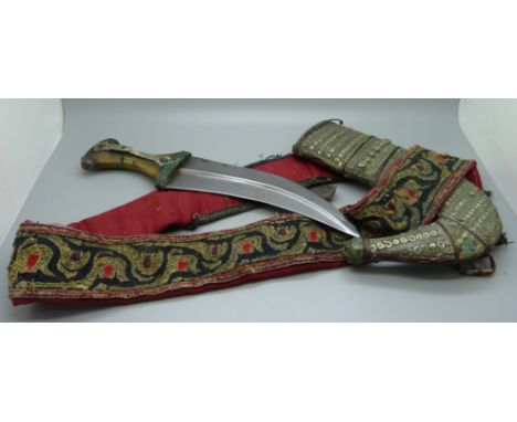 An antique Middle Eastern Jambiya dagger, with belt and scabbard 