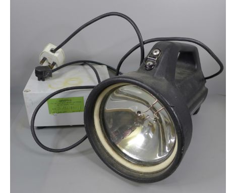A Dragon light, circa 1980, with charger 