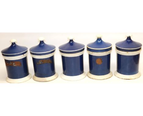 Five Apothecary or Chemists blue and white ceramic jars and covers, some remains of old paper labels H31cm (5) 