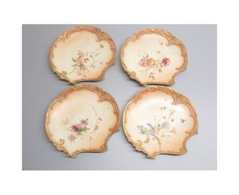 Nine Royal Worcester scallop shaped dessert plates, painted with flowers butterflies and other winged insects, in gilt scroll