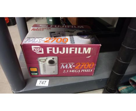 A boxed Fuji digital camera MX-2700
