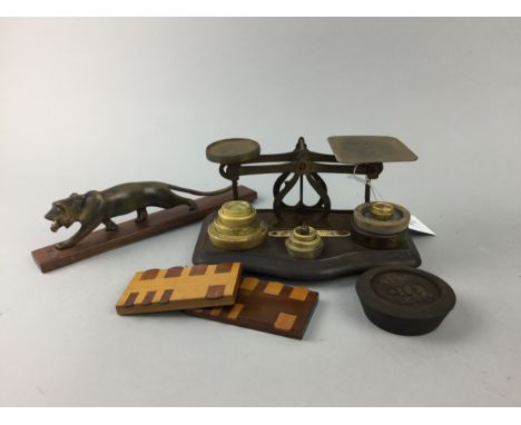 SET OF POSTAL SCALES, with weights, along with a carved wood figure of a jungle cat on stained wood base and two "Pelham" Whi