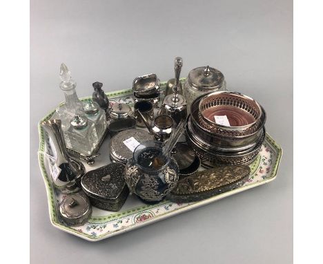 FOUR VARIOUS SILVER PLATED WINE SLIDES, along with other silver plated items, including condiments, a bell and other items in