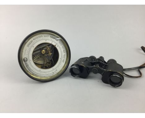 SHIP'S STYLE ANEROID BAROMETER, with thermometer, in brass case and a pair of Argus 8x30 binoculars, in leather carrying case