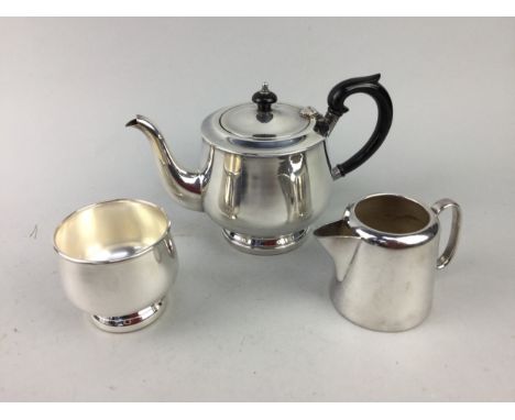 LOT OF SILVER PLATED ITEMS, including a three piece tea service, circular tray, preserve jar and other items