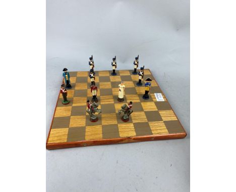 PAINTED METAL WELLINGTON AND NAPOLEON CHESS SET, contained in a fitted box, along with a chess board (2)