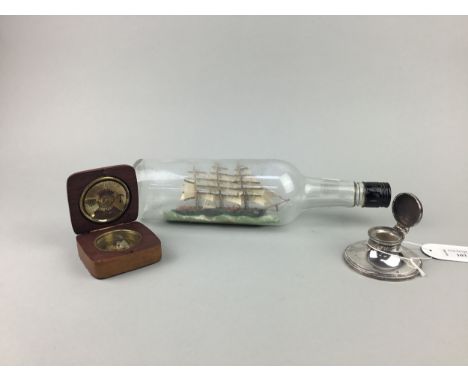 EARLY 20TH CENTURY SILVER INKWELL, 8cm diameter, along with a ship in a bottle and a compass (3)