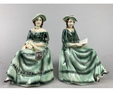 PAIR OF CERAMIC BOOKENDS, modelled as seated ladies, 14cm high, along with other ceramics, including jugs and figures