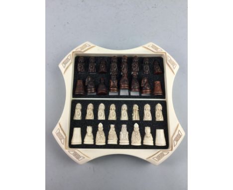 RESIN ISLE OF LEWIS CHESS SET, in fitted box, with games board cover