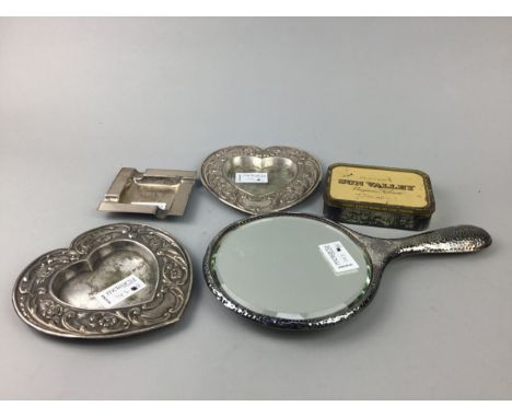 SILVER ENGINE TURNED ASH DISH, of Art Deco design along with a pair of plated heart shaped bonbon dishes and hand mirror in h