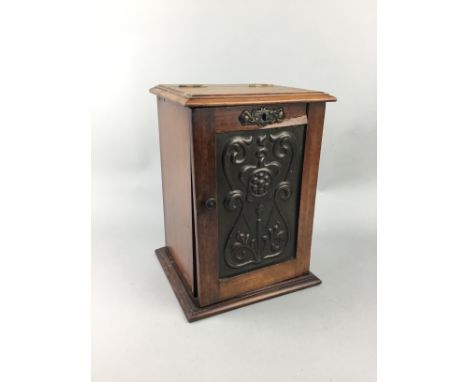 LATE VICTORIAN OAK SMOKERS CABINET, the door inset embossed Art Nouveau brass panel, 28cm high