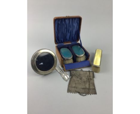 CIRCULAR SILVER PHOTOGRAPH FRAME, Birmingham marks, along with a cased set of two silver and guilloche enamel backed brushes,