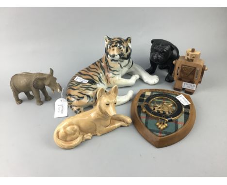 THREE CERAMIC ANIMAL FIGURES, along with a small resin elephant, wooden musical robot and a clan crest (6)