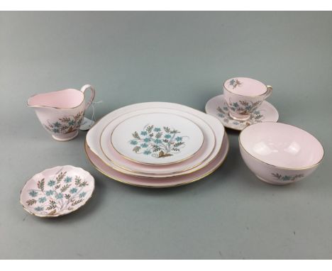 TUSCAN 'BLUE STAR' PART TEA SERVICE, with floral and gilt decoration on a pink ground