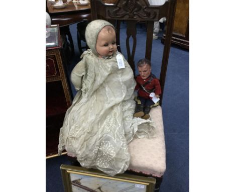 20TH CENTURY DOLL, in vintage dress, along with another doll dressed as a soldier (2)