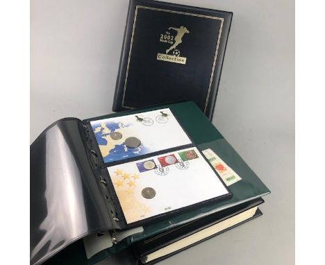 THE 2002 WORLD CUP COLLECTION, first day covers in three albums, along with an album of first day covers and stamps (4)