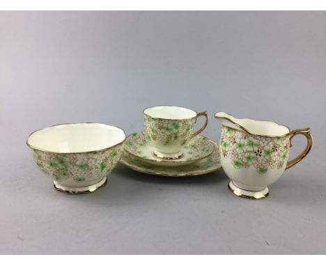 ROYAL ALBERT CROWN CHINA TEA SERVICE, with green flower head and gilt decoration