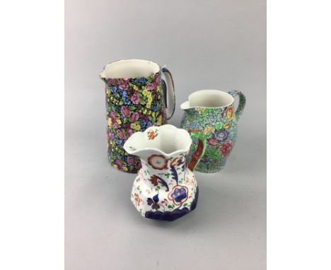 CROWN BURSLEM CERAMIC JUG, with floral decoration, 22cm high, along with other ceramic jugs, including Copeland Spode and Mas