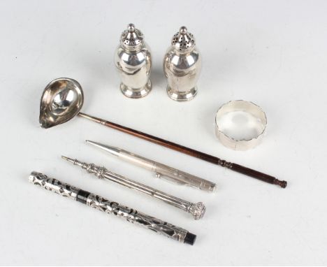 A silver mounted fountain pen, London 1914, a silver mounted propelling pencil with engine turned decoration, the clip detail