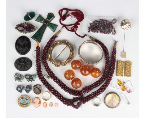 A small group of jewellery, including two multiple strand garnet bead necklaces, a Thomas L. Mott sterling silver circular br