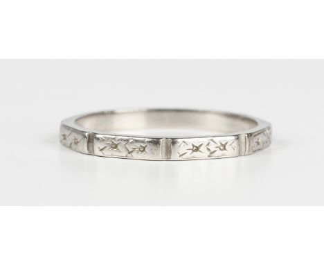 A platinum decorated wedding ring, detailed 'Platinum', weight 3.1g, ring size approx O1/2.Buyer’s Premium 29.4% (including V